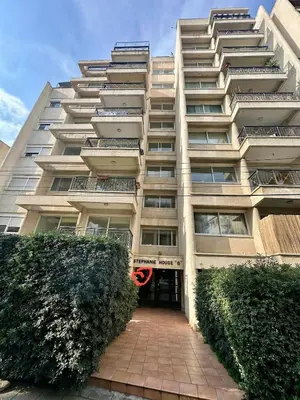 a large apartment building with a large window at 2 bedrooms flat near center in Engomi