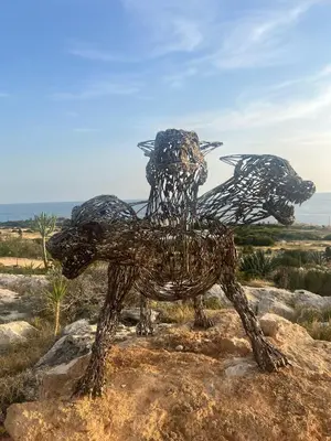 a metal statue of two people riding a horse at MANDARIN Villa in Paralimni