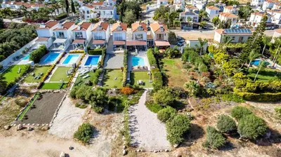 an aerial view of a house with a swimming pool at Ayia Thekla Beach House in Ayia Napa