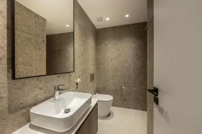 a bathroom with a sink and a toilet at Villa Nissi 1 in Ayia Napa