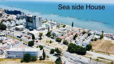 a view of a city with a sea side house at Sea side House in Voroklini
