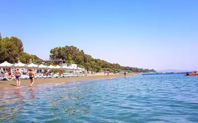 a group of people walking on the beach at Boutique & Brand New Prime Location Park & Beach in Limassol