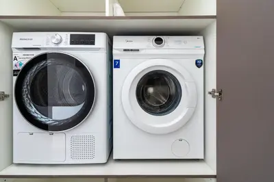 a washing machine and a dryer in a laundry room at Le Bandit Studio in Larnaka