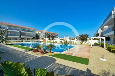 an image of a swimming pool in a building at Cosy 2Br Family Apartment - Mythical Sands Resort in Paralimni