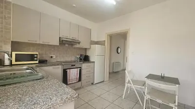 a kitchen with a sink and a counter top at STAY Elion Apartment in Nicosia
