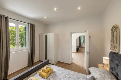a living room with a couch and a window at Galata Watermill Cottage in Nicosia
