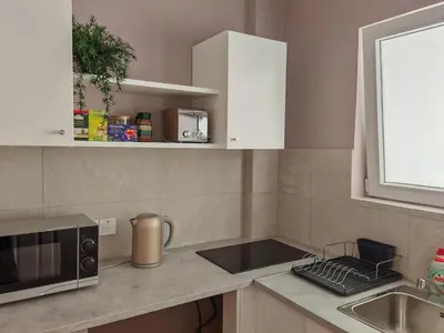 a kitchen with a counter top with a microwave at Studio in the center of Nicosia 3 in Nicosia
