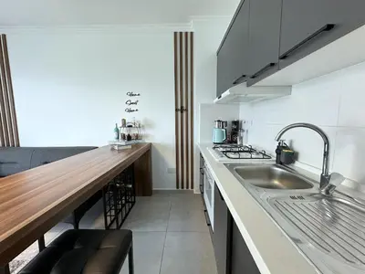 a kitchen with a sink and a counter top at Cheap Holiday Opportunity in North Cyprus in Larnaka