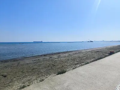 a beach with the ocean in the background at Superior 1 bed apartment in Oroklini with Communal Pool in Voroklini