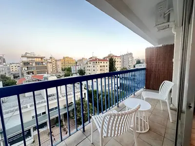 a balcony with a view of a city at Adonis Holiday Apt - Nicosia in Nicosia