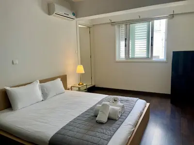 a bedroom with a bed with a teddy bear on it at The Comfort Stay in Nicosia Verenikis - Platform 357 in Nicosia