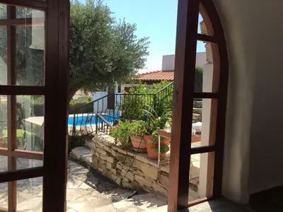 a view of a pool from a window at Cobblers in Maroni