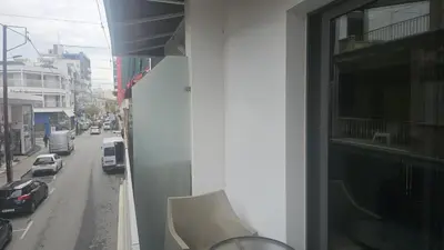 a view of a street from a window of a building at STAY Finibreeze Apartment in Larnaka