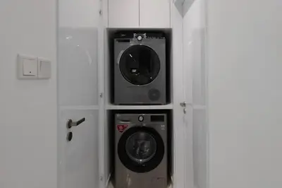 a door to a room with a washing machine in it at Kakopetria Luxury Villa w pool in Kakopetria