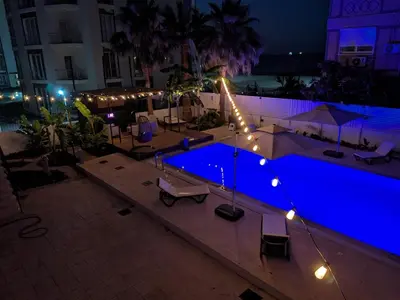 a swimming pool at night with blue lighting at Heritage Villas Northern Cyprus in Mağusa