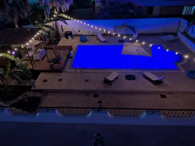 an overhead view of a swimming pool at night at Heritage Villas Northern Cyprus in Mağusa