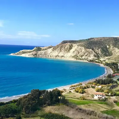 a view of a beach next to the ocean at Eros Villa-Private Luxury Estate in Pissouri
