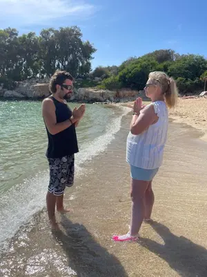 a man and a woman standing on a beach at Awaken Your Hidden Goddess Retreat at Nissi Avenue - Central Ayia Napa in Ayia Napa
