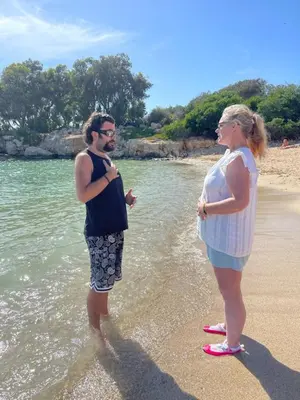 a man and a woman standing on the beach at Awaken Your Divine Self Sacred Self Discovery Retreat in Ayia Napa Cyprus in Ayia Napa