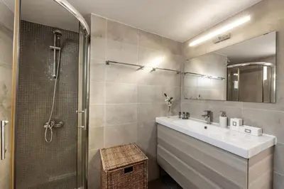 a bathroom with a sink and a shower at Larnaca Seaside Villa Marina 44 in Pervolia