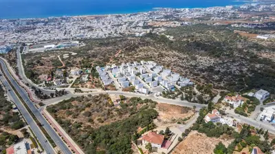 an aerial view of a city with buildings and roads at Elite Blu Heights Villa in Ayia Napa