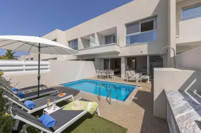 an image of a villa with a swimming pool at Milan's Mythical Villa in Paralimni