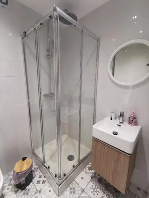 a bathroom with a shower and a sink at Anne 3 Bedroom Apartment in Larnaka
