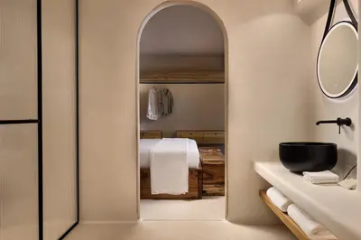 a bathroom with a mirror and a sink at Aya Resort - Adults Only in Ayia Napa