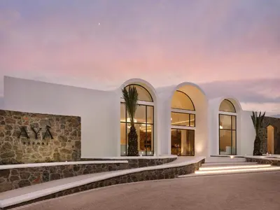 a facade of a building with large windows at Aya Resort - Adults Only in Ayia Napa
