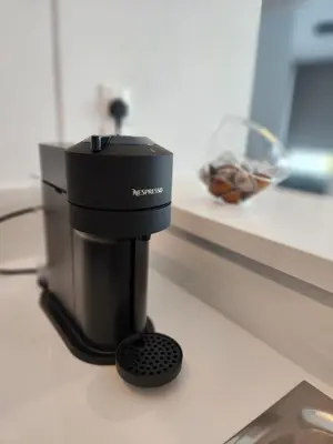 a microscope sitting on top of a table at Infinity Luxury Mansions in Yeri