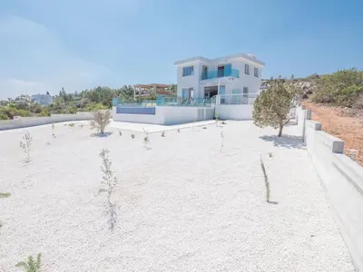 a large yard in front of a house at Villa Clea,stunning 4bdr Protaras Villa, Seaviews in Protaras