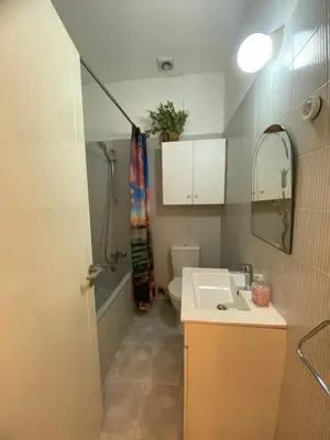 a small bathroom with a sink and a toilet at Sunny 2BR Home in Paralimni Near Beaches,Protaras! in Paralimni