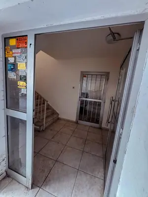 an open door to a room with a staircase at Cozy & Stylish 1Bedroom Apartment in Limassol