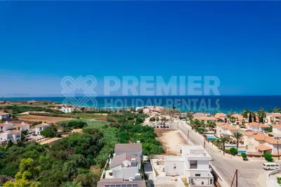 arial view of a residential neighbourhood in front of the ocean at Villa Coral in Paralimni