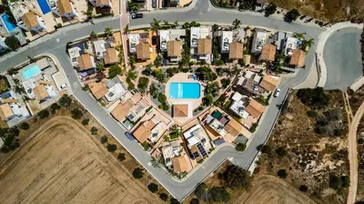 an aerial view of a suburb with houses at Villa Enaria Serene 3Bdr Retreat in Ayia Thekla in Ayia Napa