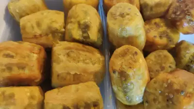 a close up of a box full of doughnuts at Ambeli - Ambeloui in Kalopanayiotis
