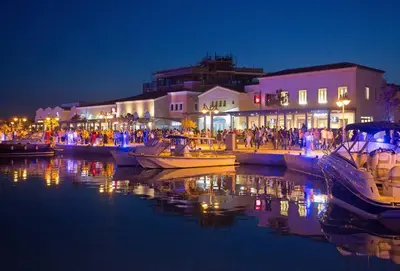 a group of boats docked in a harbor at night at Bridge House 202-2BR Modern Apartment in Limassol