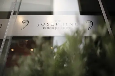 a sign for the josephine boutique hotel at The Josephine Boutique Hotel in Larnaka