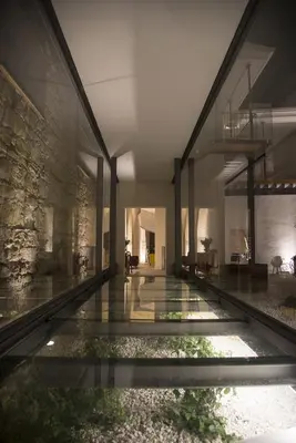 a hallway of a building with a glass floor at Lokàl Boutique Hotel in Larnaka