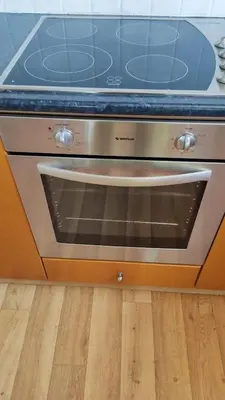 a stove top oven sitting on top of a wooden floor at Poseidon 502 penthouse in Larnaka