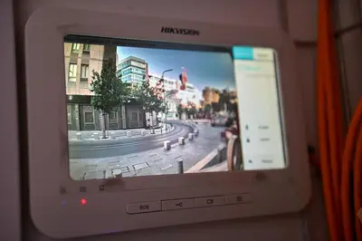 a television screen with a picture of a street at The 1 -Nicosia Luxe Stay- Gym Pool 24h Concierge in Nicosia