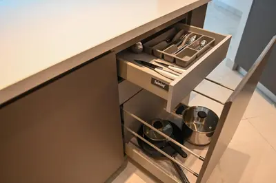 a kitchen counter with a drawer with utensils at The 1 -Nicosia Luxe Stay- Gym Pool 24h Concierge in Nicosia