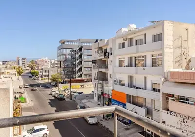 a view of a city street with tall buildings at Urban Bay Limassol in Limassol