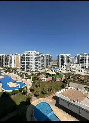 an aerial view of a city with buildings at Bedroom flat Caesar resort, Iskele north Cyprus in Vrysoules