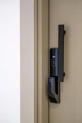 a lock on the door of a hotel room at Artemis 103 - Seaside Stories in Livadhia