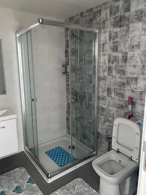 a bathroom with a shower and a toilet at Northern Cyprus Iskele Bogaz Abelia One plus One Sea View in Boğaz