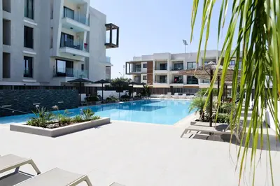 an image of a swimming pool in a building at Cosmos Residence C102 in Paralimni