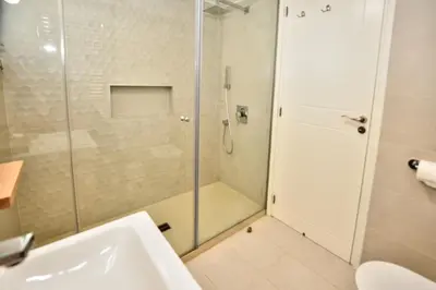 a bathroom with a shower and a sink at Villa Emilia in Ayia Napa