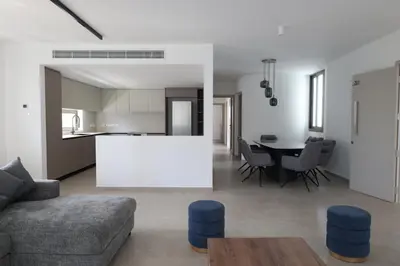 a living room with a couch and a table at Alaya Residence in Nicosia