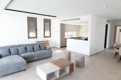 a living room with a couch and a table at Alaya Residence in Nicosia